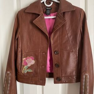 Guess leather embroidered with roses jacket. Size small.